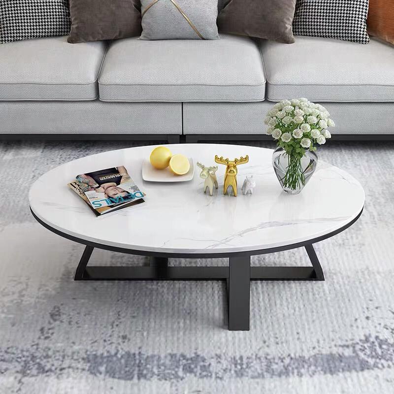 Table basse ronde en marbre blanc avec piètement en métal noir – Design moderne